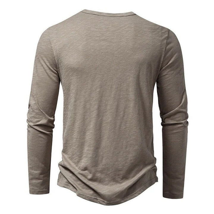 Versatile men's casual henley shirt, perfect for everyday wear & layering. Comfortable fit.