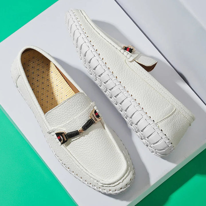 Bottom sole of men's classic leather bit loafers, highlighting durable construction and good traction