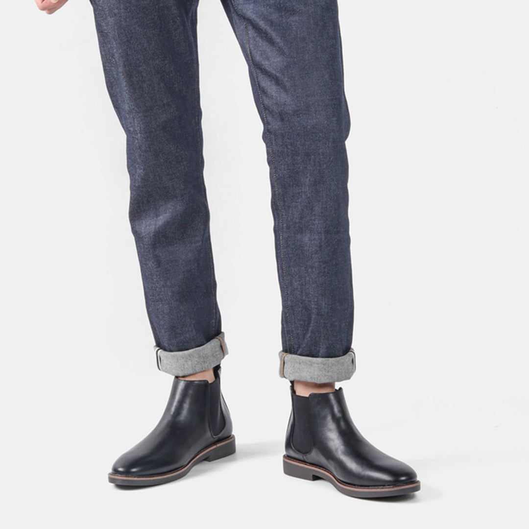 Men's fashionable Chelsea boots in a rich burgundy leather, adding a pop of color to outfits
