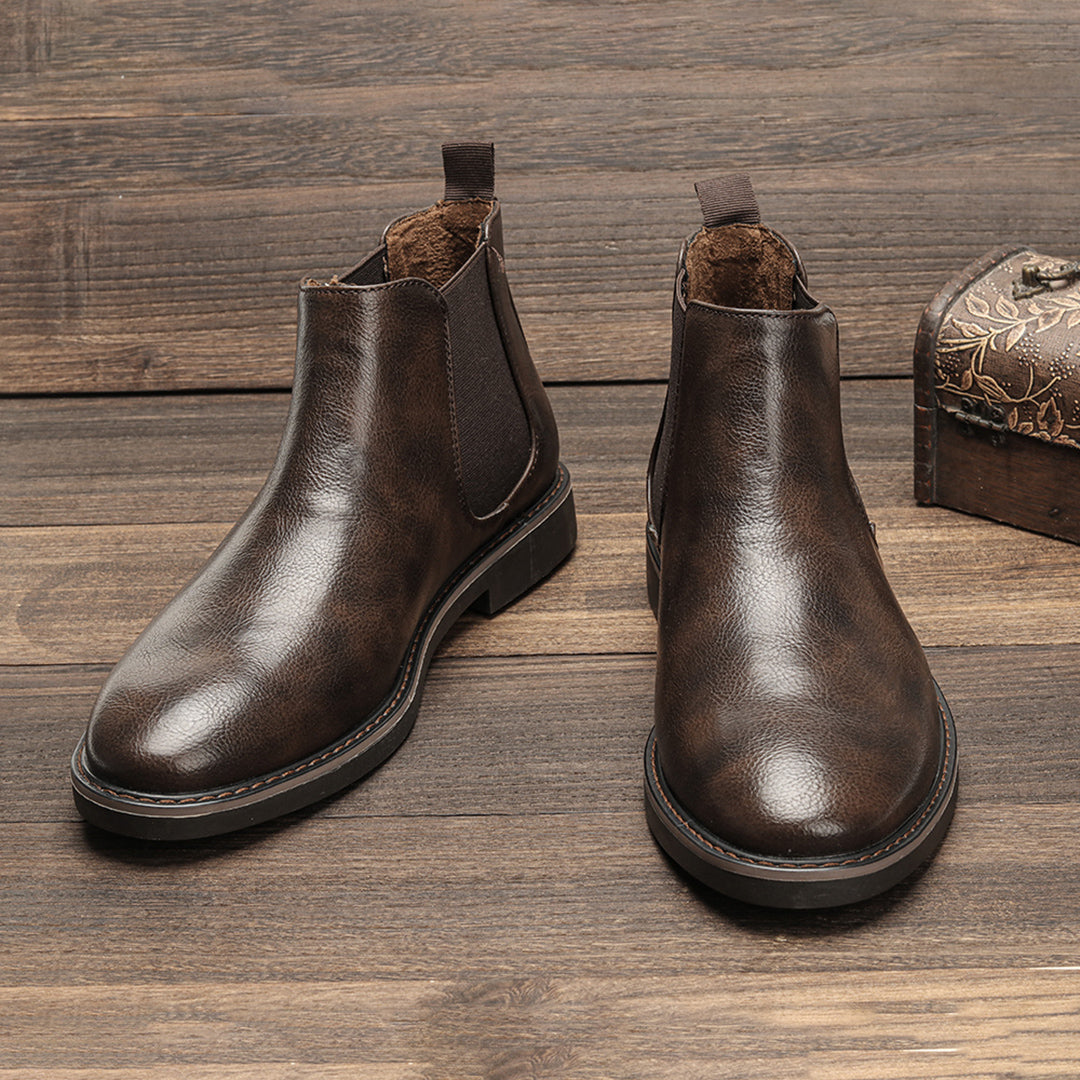 Men's grey suede Chelsea boots, offering a sophisticated and modern casual look