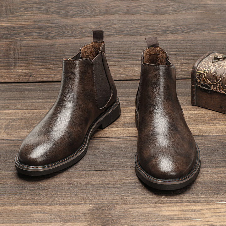 Men's grey suede Chelsea boots, offering a sophisticated and modern casual look