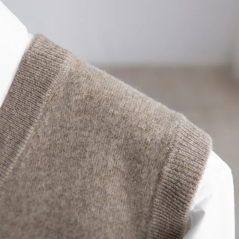 Comfortable men's V-neck sweater vest, a lightweight and essential layering piece.