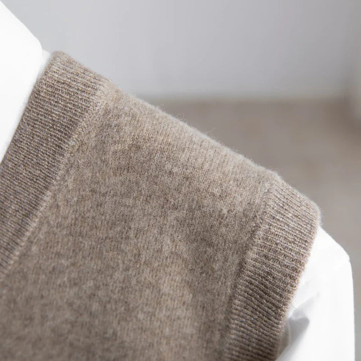 Comfortable men's V-neck sweater vest, a lightweight and essential layering piece.