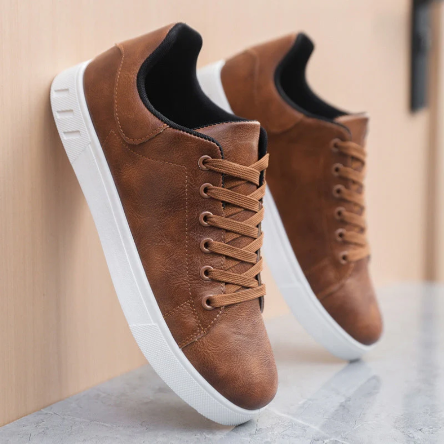 View of the sole of a men's classic white low-top sneaker, athletic and durable footwear