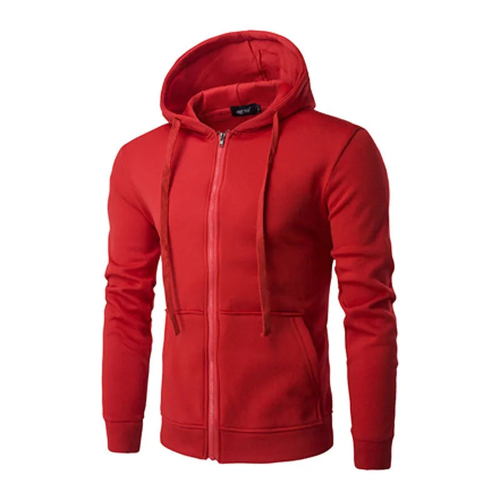 Model wearing a men's zip-up street hoodie with hands in pockets, demonstrating casual look
