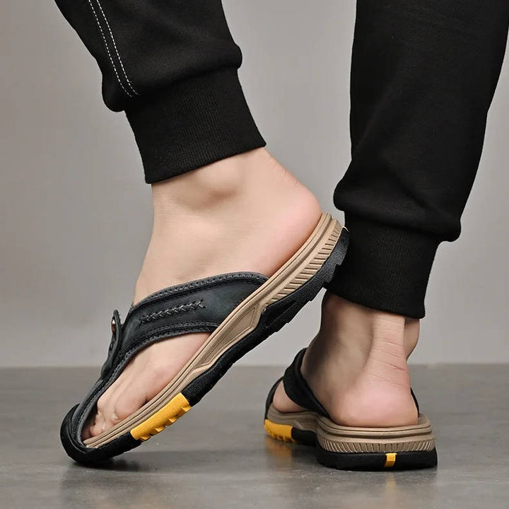 Durable men's closed-toe water-resistant sandals. Non-slip outdoor footwear for active summer comfort.