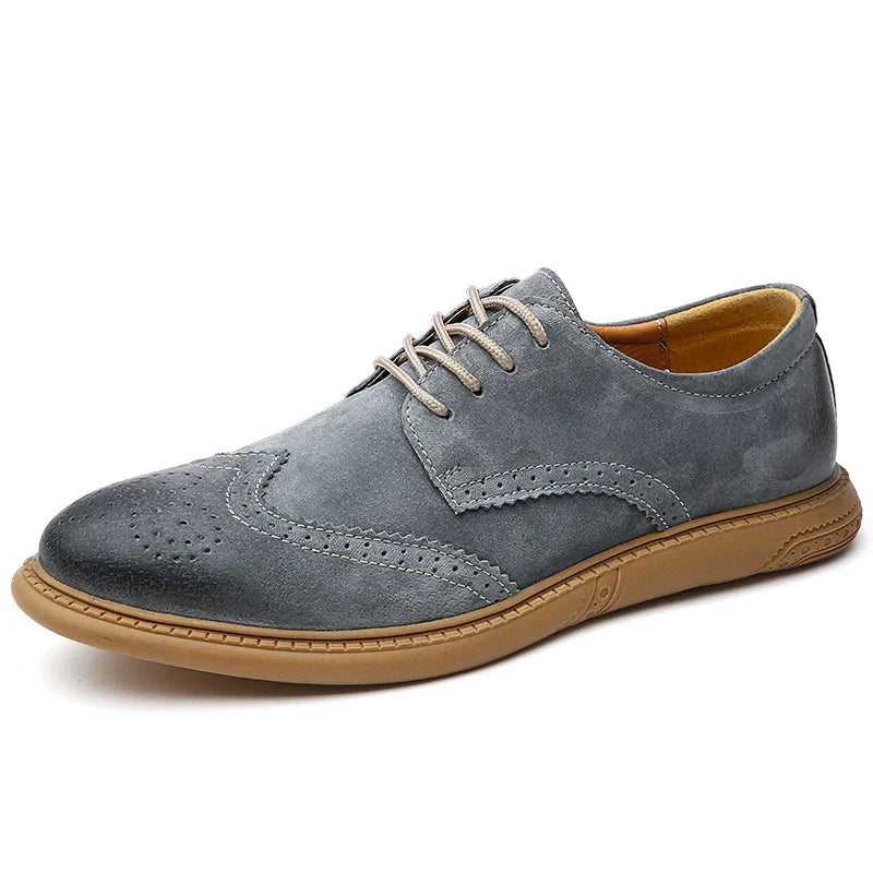 Elegant men's lace-up dress shoes featuring classic brogue details, perfect for a refined stylish appearance.