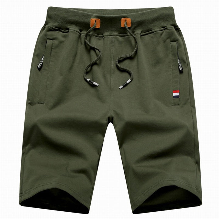 Men's comfortable casual drawstring shorts with secure zipper pockets, ideal for everyday summer wear.