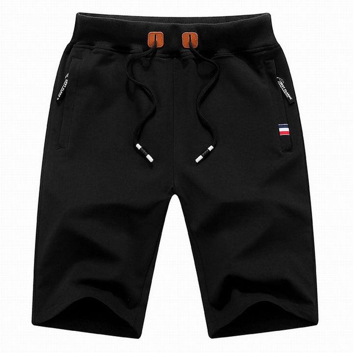 Comfortable men's casual shorts with drawstring waist and practical secure zipper pockets for active use.