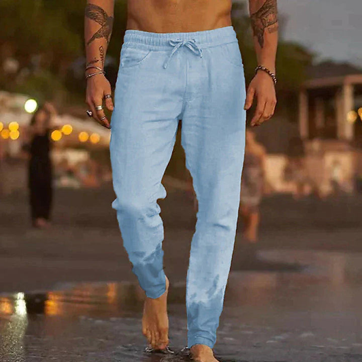 Lightweight men's summer jogger pants with drawstring. Relaxed fit casual trousers, perfect for comfort & active fashion.