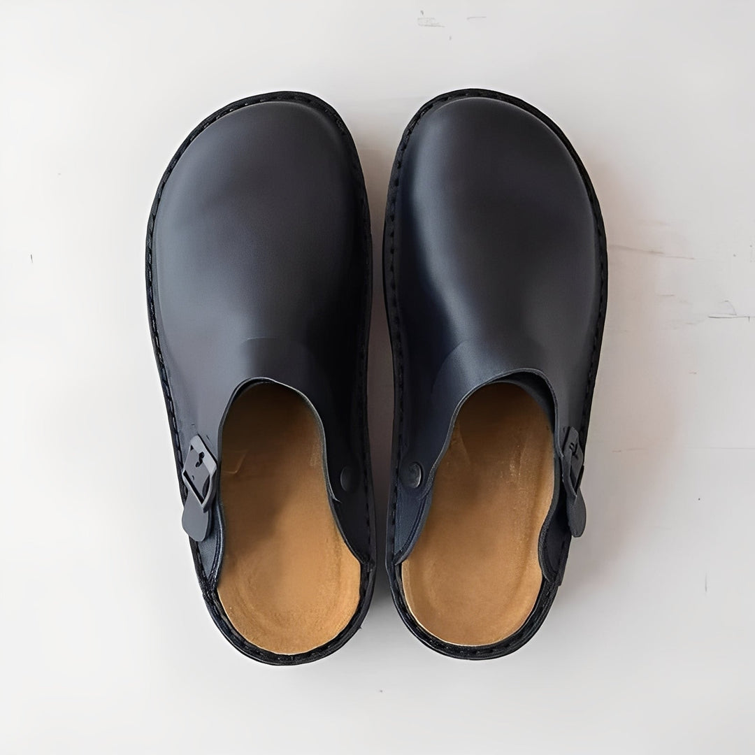 Men's comfortable house slippers with supportive removable insole for ultimate indoor foot comfort.