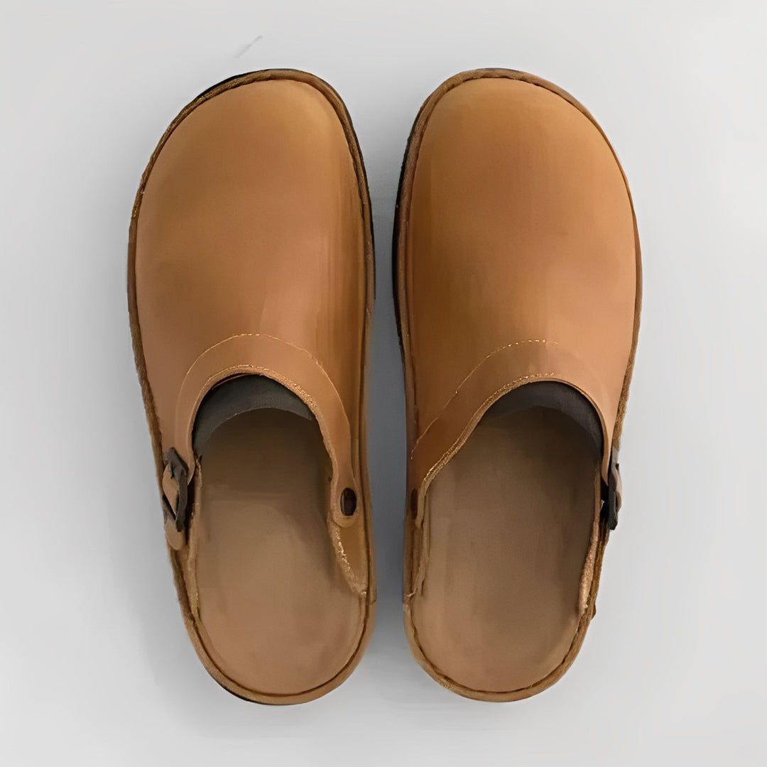 Cozy men's lounge slippers, perfect for home comfort & casual indoor wear, featuring supportive design.