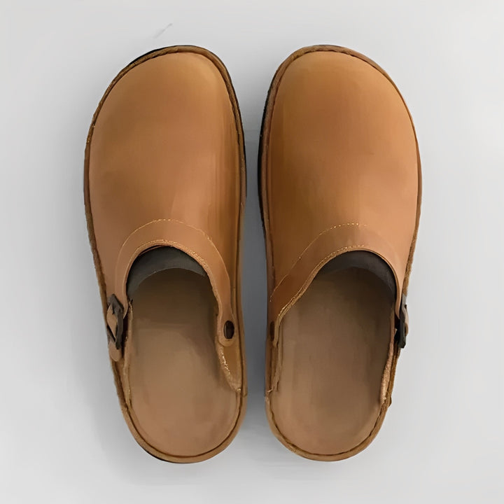 Cozy men's lounge slippers, perfect for home comfort & casual indoor wear, featuring supportive design.