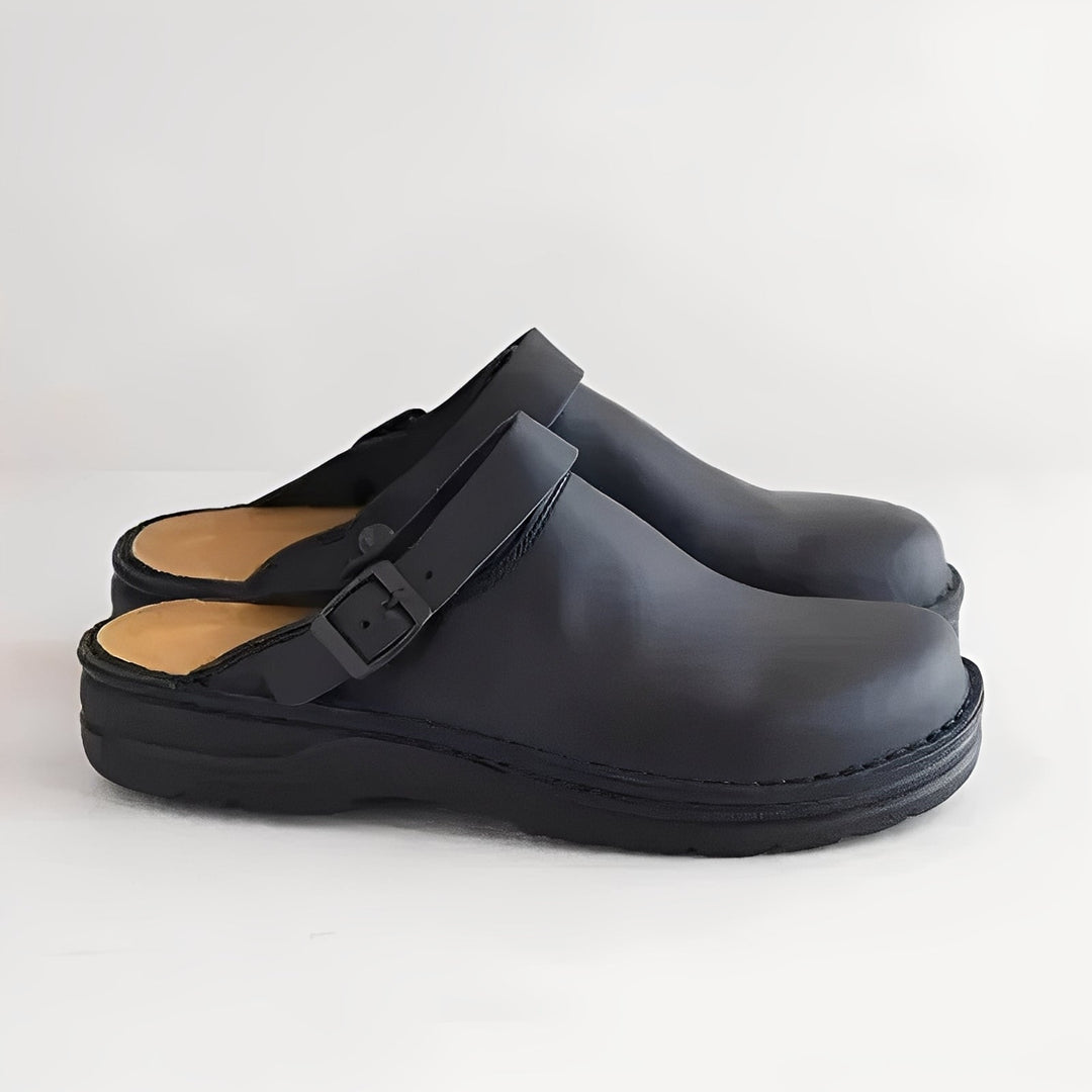 Men's indoor footwear designed for superior foot comfort, featuring a cozy feel and supportive insoles.