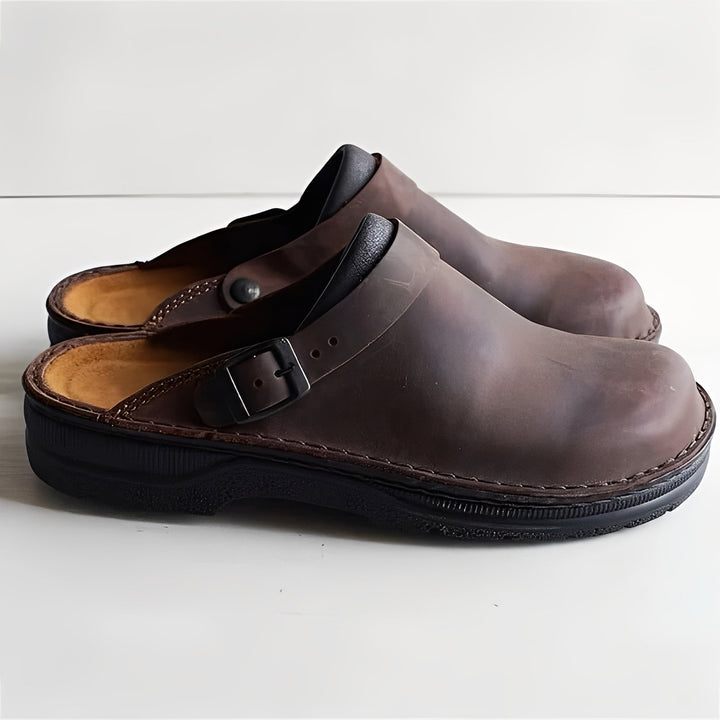 Durable men's casual slippers offering ultimate home comfort with a supportive, removable insole.