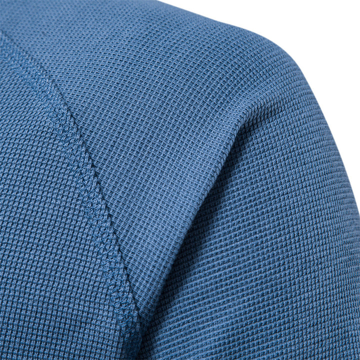 Classic men's long sleeve shirt in a comfortable fabric, perfect for casual winter outfits.