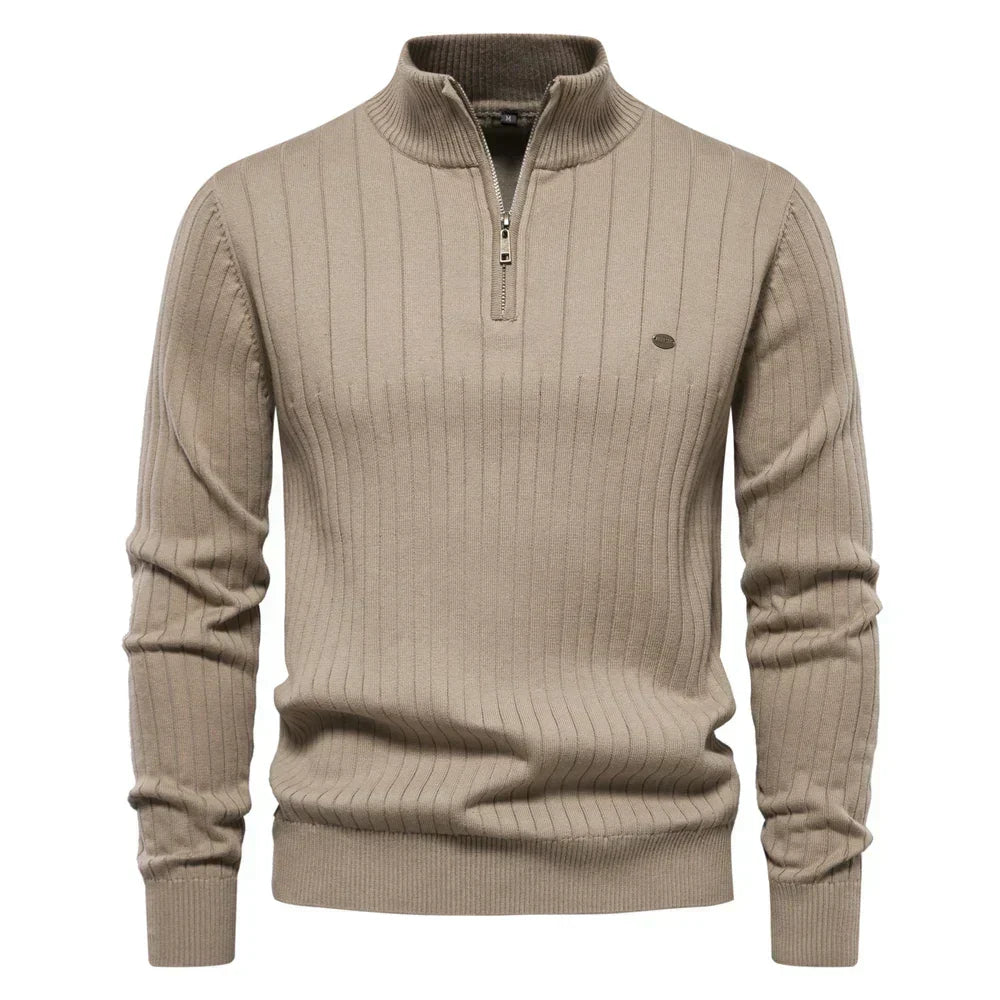 Comfortable men's knitwear sweater. Features a practical zipper & stylish stand-up collar. Warm winter apparel.