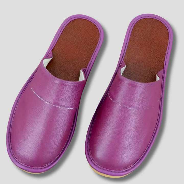 Comfortable men's slip-on footwear; cozy house shoes perfect for home relaxation.