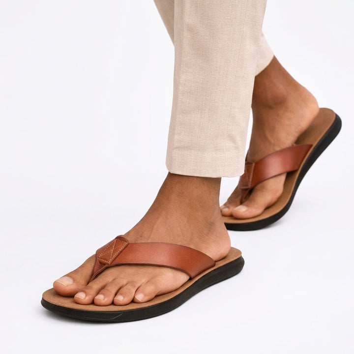 Comfortable men's slip-on toe post sandals, featuring a cushioned design for casual summer walks & beach days.