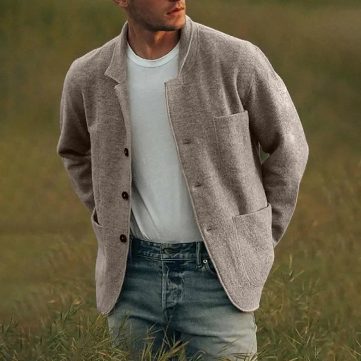 Lightweight men's knit cardigan, tailored slim fit, ideal versatile layering piece for autumn fashion.