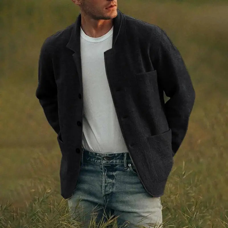 Close-up of a men's tailored slim fit cardigan with button closure, smart casual autumn style.