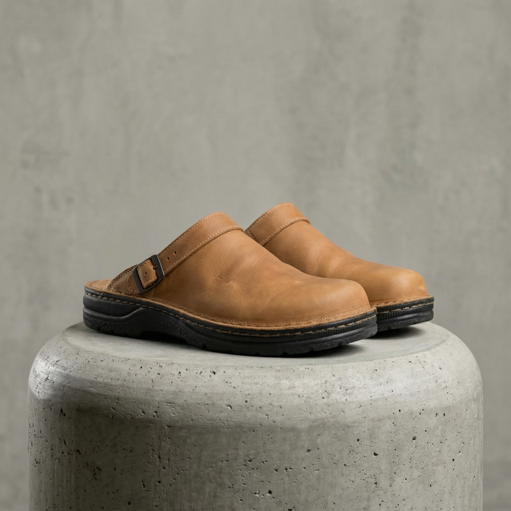 Black men's orthopedic clogs with arch & foot support. Slip-resistant comfort footwear for all-day wear.