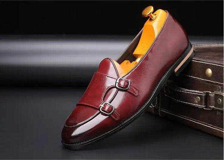 Front view of men's double buckle monk strap loafers, rich leather texture