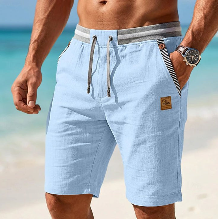 Relaxed fit men's drawstring shorts, ideal for beach, vacation, or casual summer wear.