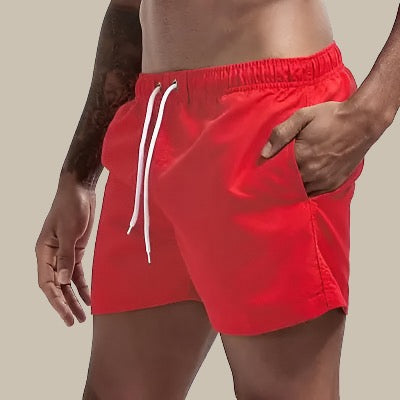 Stylish men's swim shorts featuring an adjustable drawstring for a secure, comfortable fit.