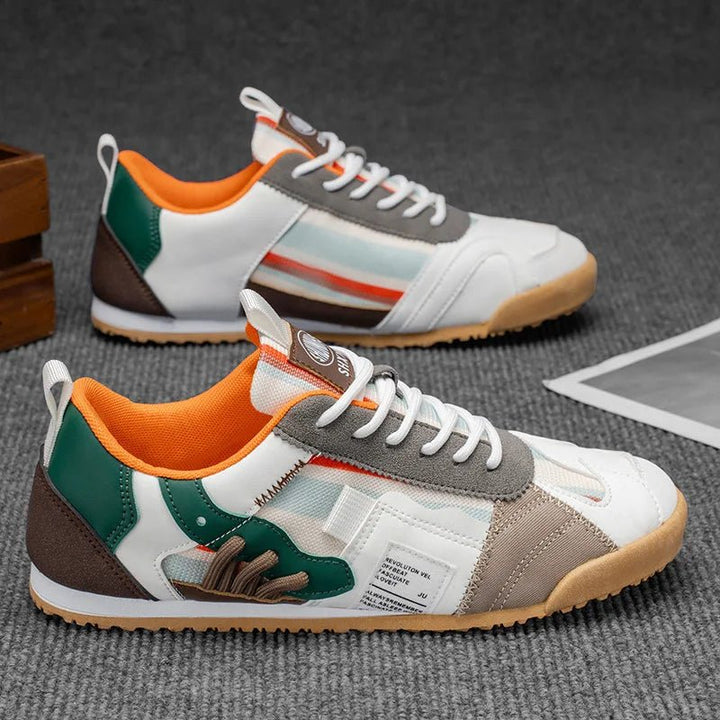 Unique patchwork design on men's durable utility sneakers, perfect for urban explorers.
