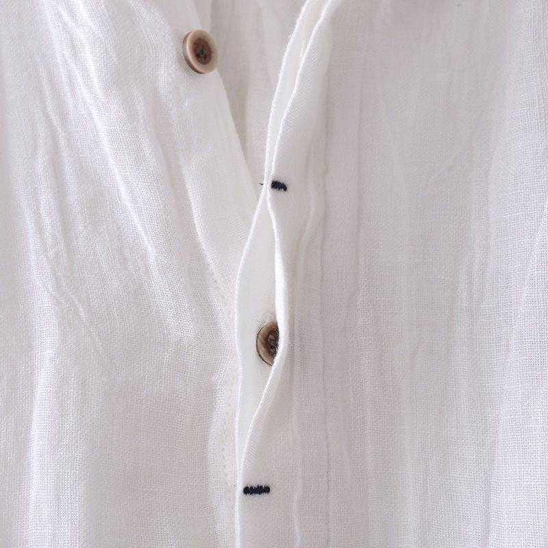 Men's short sleeve casual shirt, relaxed fit, textured. Comfortable and versatile summer top for effortless warm weather style.