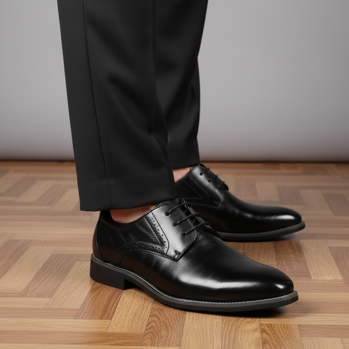 Men's elegant black leather formal dress shoes with lace-up design, perfect for business and office wear.