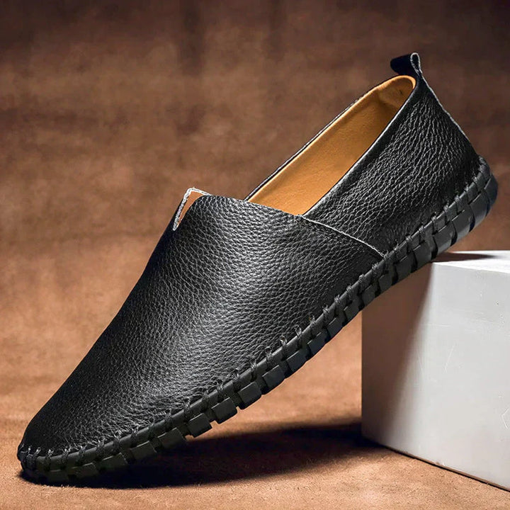 Modern men's matte slip-on loafers, a stylish and elegant choice for contemporary fashion.