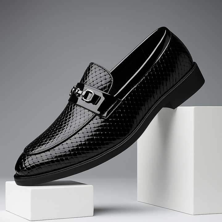 Side profile of men's embossed leather slip-on loafers, ideal for dress or casual wear.