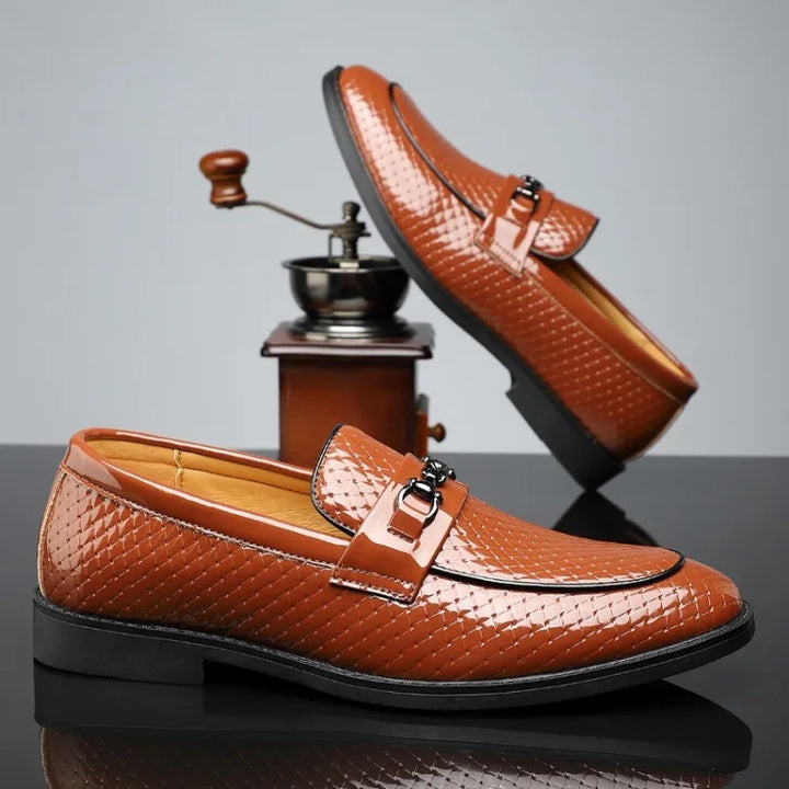Men's luxurious embossed leather bit loafers in deep navy, perfect for modern men's fashion.