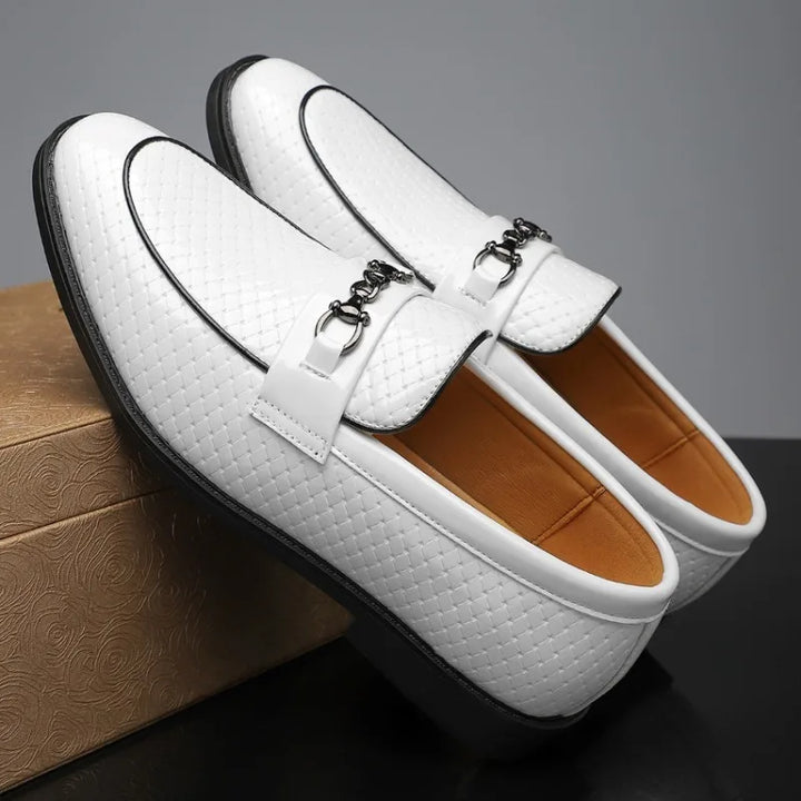 Back view of men's embossed leather loafers, emphasizing the sturdy construction of these dress shoes.