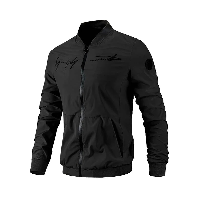 Close-up of a men's embroidered bomber jacket with intricate design. Fashionable transitional outerwear, ideal for casual style.