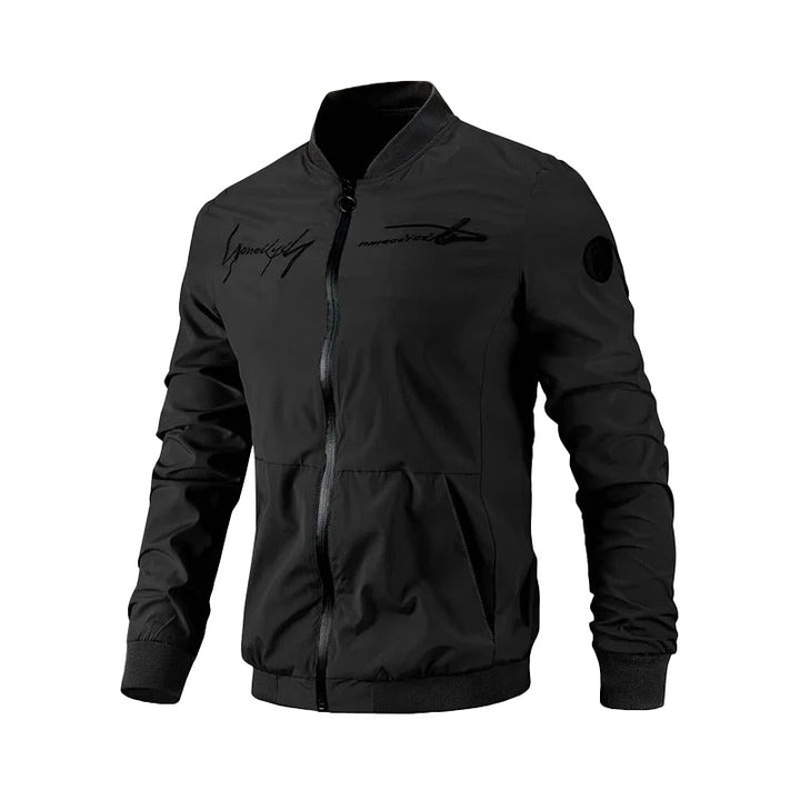 Close-up of a men's embroidered bomber jacket with intricate design. Fashionable transitional outerwear, ideal for casual style.