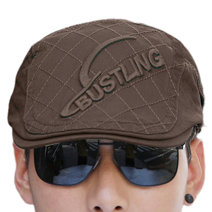 Texture shot of the cotton fabric on a men's embroidered beret, soft and comfortable men's headwear.