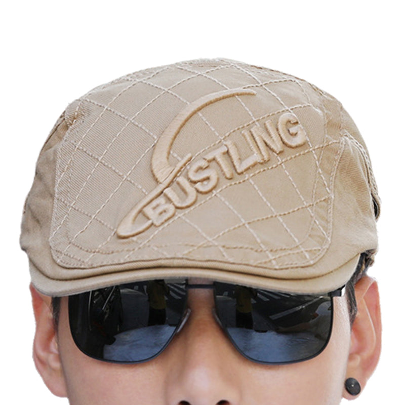 Men's embroidered cotton beret on a mannequin head, presenting its fit and style clearly.