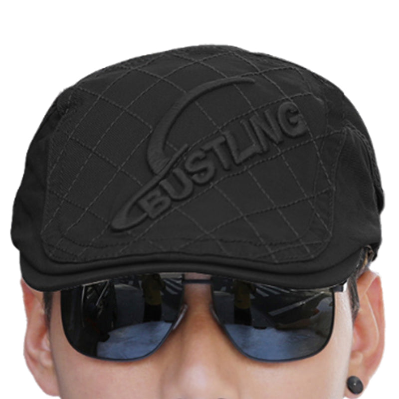 Close-up of the beret's brim and embroidery, essential details for this men's cotton hat.