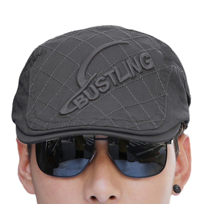 Collection of men's embroidered cotton berets, showcasing diverse embroidery patterns and colors.