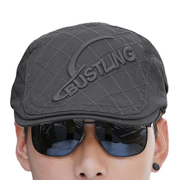 Collection of men's embroidered cotton berets, showcasing diverse embroidery patterns and colors.