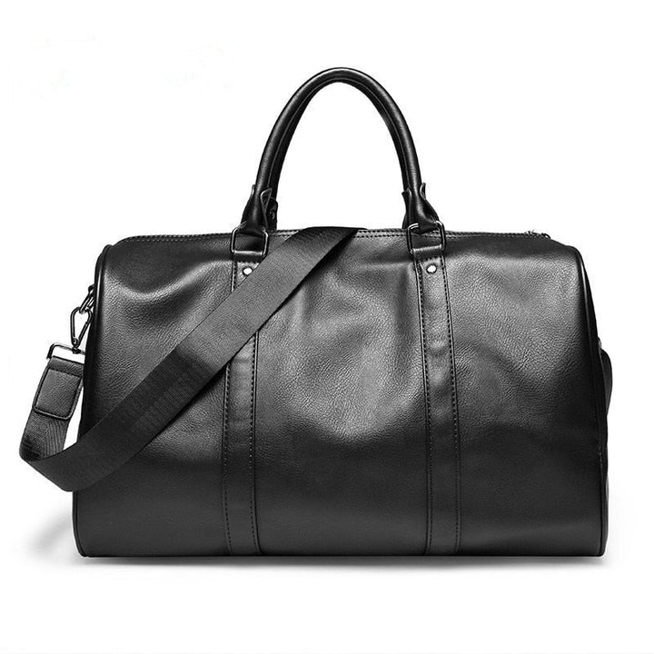 Men's faux leather travel duffel bag, spacious weekender for trips and carry-on luggage.