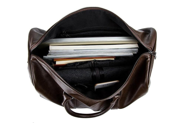 Men's stylish faux leather duffel, durable carry-on for travel & weekender use.