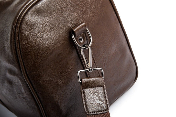 Versatile men's faux leather duffel, ideal carry-on or spacious travel luggage.