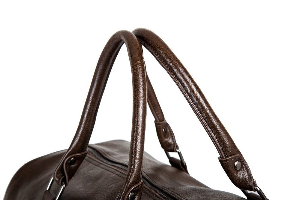 Premium faux leather men's duffel, large capacity travel bag for all your gear.