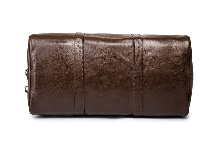 Men's faux leather carry-on duffel, spacious & durable for travel adventures.