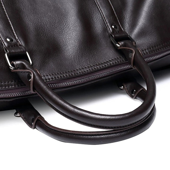 Men's travel duffel, versatile faux leather carry-on for weekend getaways.