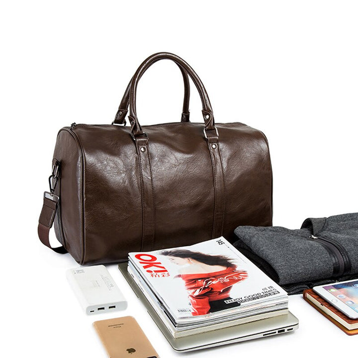 Faux leather men's travel duffel, a large capacity carry-on weekender bag.